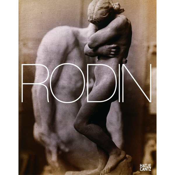 Das sepiafarbene Cover des Buches RODIN zeigt eine Fotografie einer schlanken weiblichen Skulptur vor dem unscharfen Torso einer männlichen Skulptur.