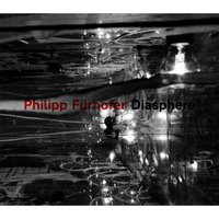 Schwarz-weißes, abstraktes Coverbild mit Lichtreflexionen und Glühbirnen. Der Titel Philipp Fürhofer Diasphere ist in roter und weißer Schrift darübergelegt.
